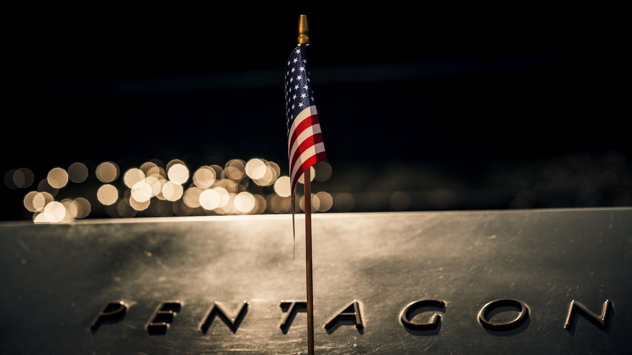 USA Taskforce Pentagon: Close-up of an American flag draped across the iconic Pentagon